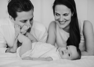 dad looks at baby mom looks at dad