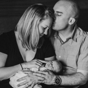 parents with their newborn baby