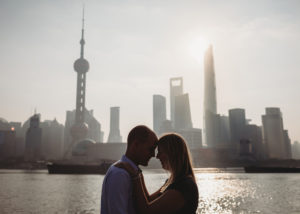 silhouette of couple in front of Shanghai skyline