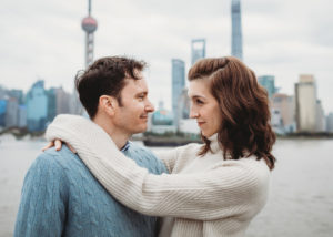 a couple in front of the Shanghai skyline