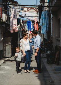 family portrait in an alley in Shanghai