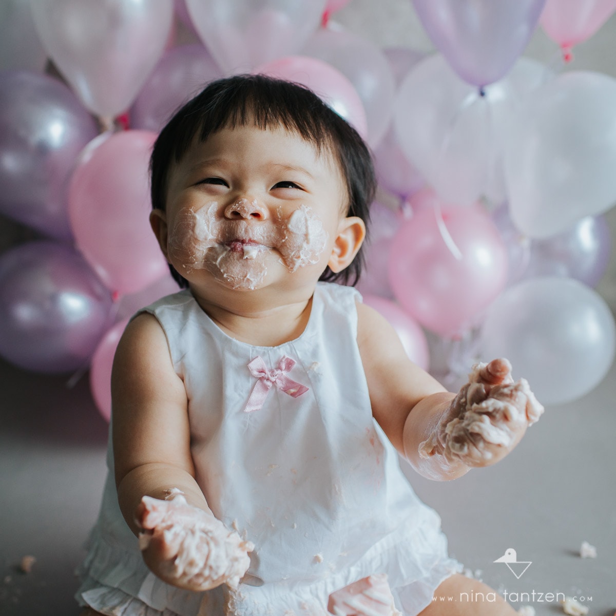 happy baby girl with cake