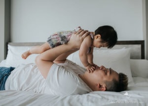 cuddles with dad and baby