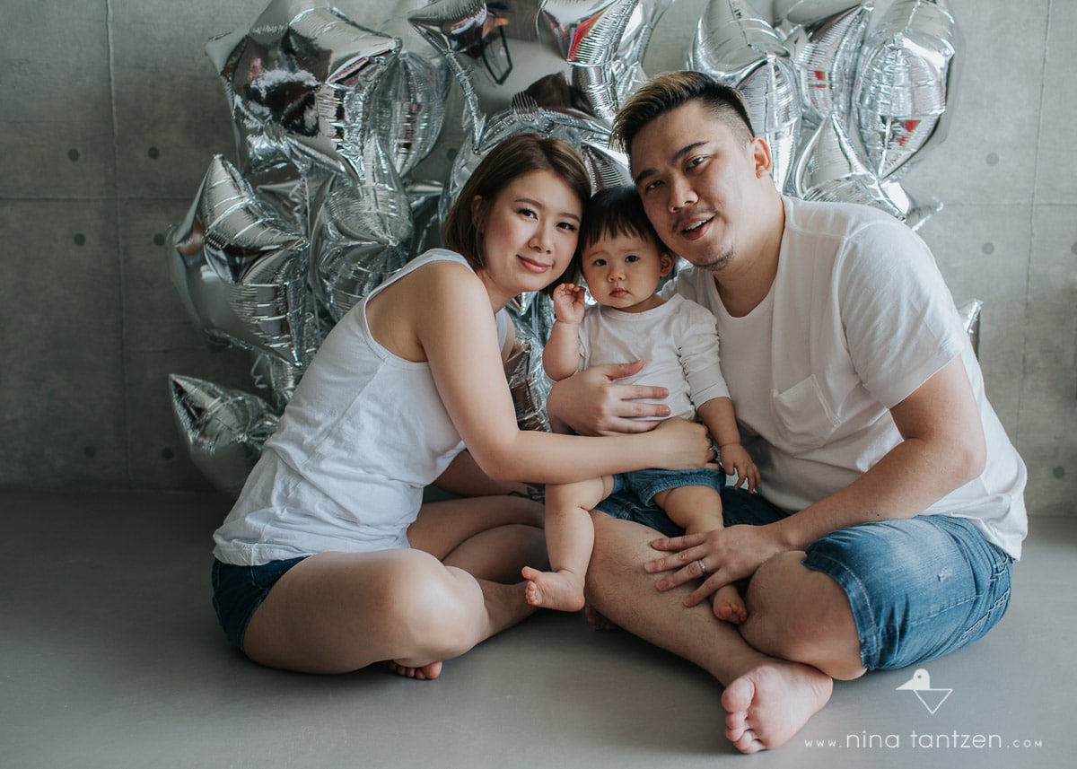 family portrait with silver balloons