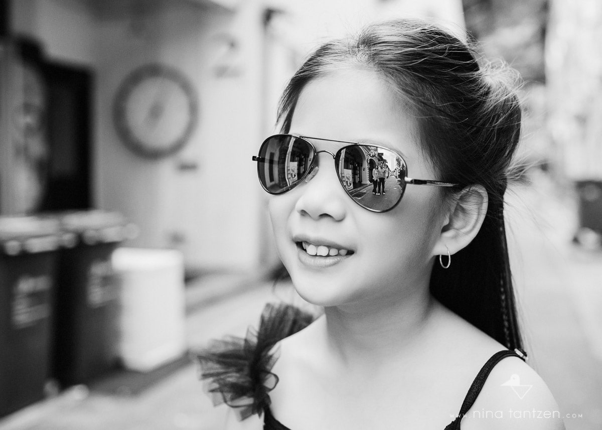 fun portrait of girl with mirrored sunshades