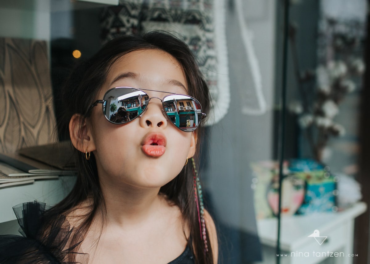 photo of little girl and her sunglasses