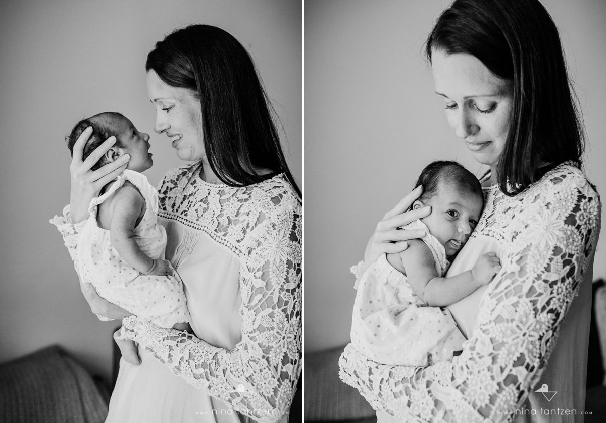 mother holding newborn baby