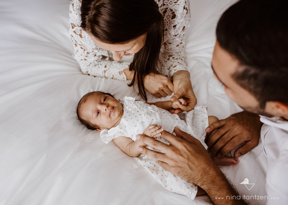 family with newborn baby