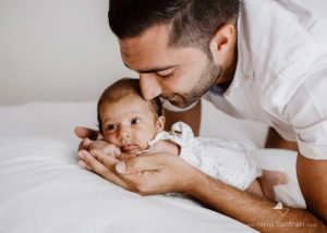 dad with his newborn baby