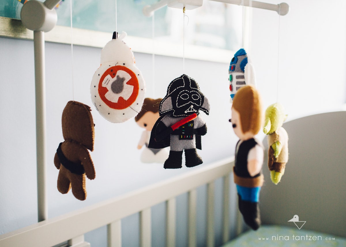 star wars mobile hanging over baby crib