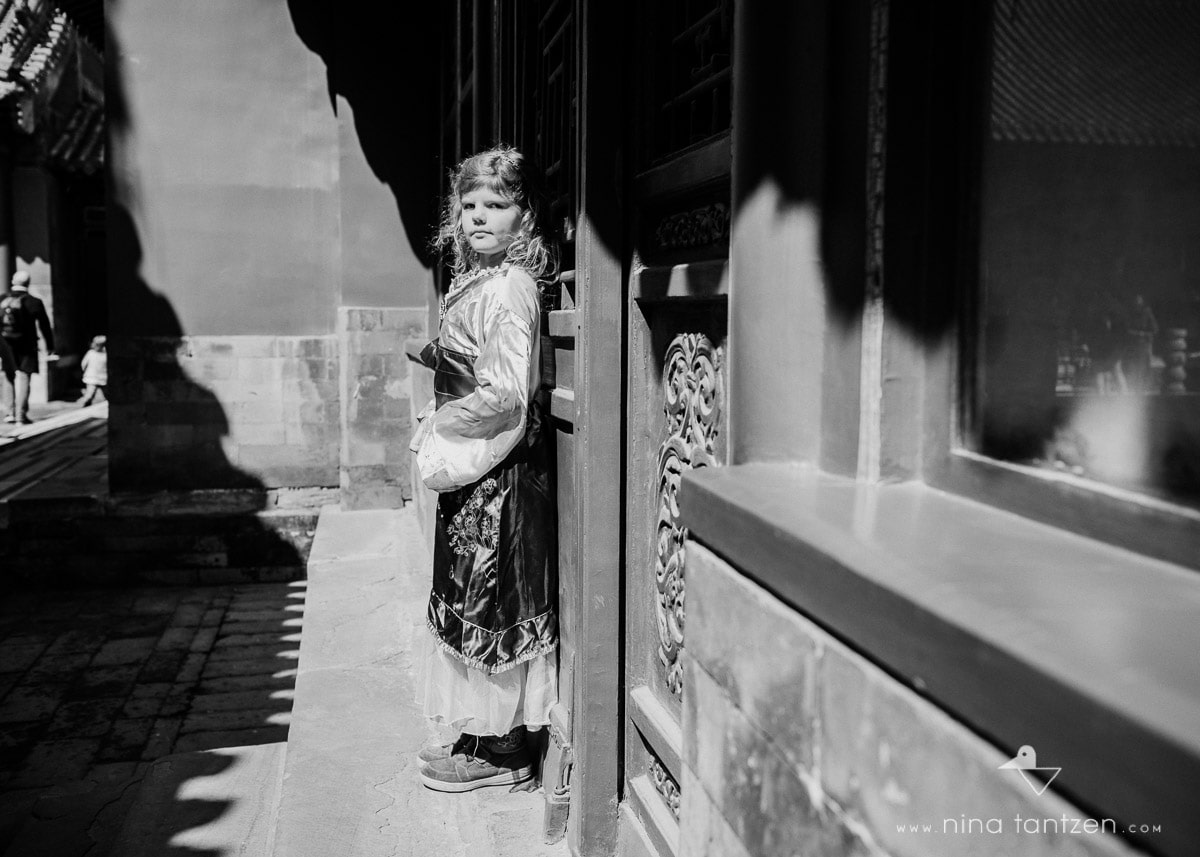 monochrome portrait of girl in forbidden city beijing china
