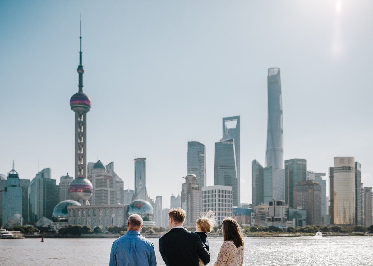 Couple with toddler and grandpa on the Shanghai Bund