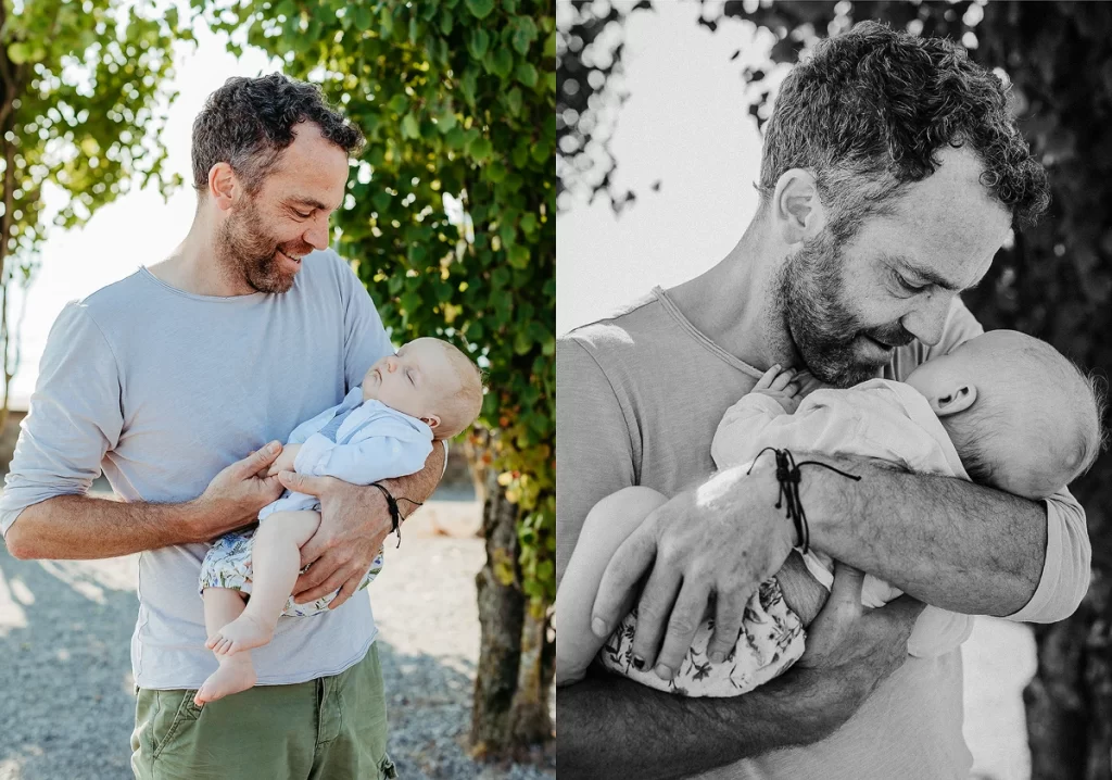 Portrait von Vater mit Baby im Arm in Zürich