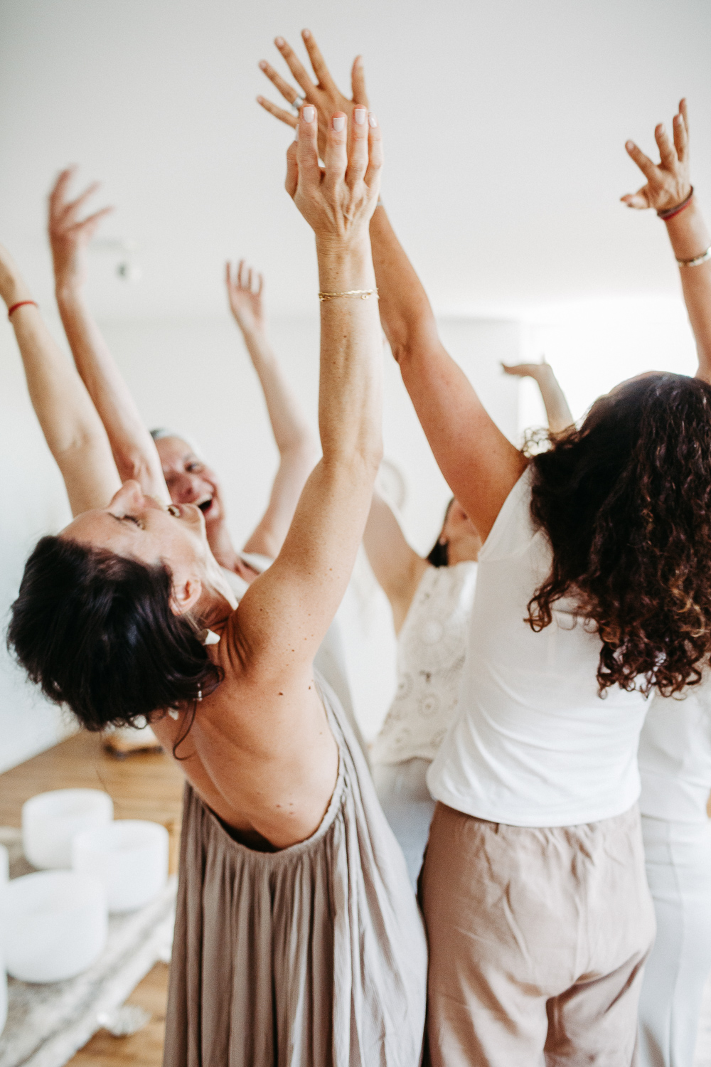 Women with open arms during a personal branding session for Women's Circles in Zurich